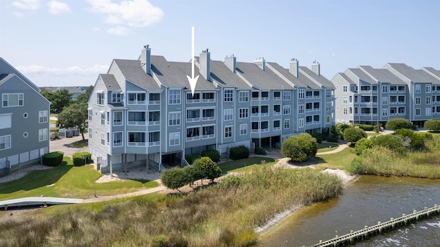 exterior space with a water view