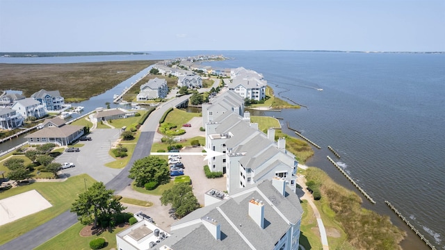 aerial view with a residential view and a water view