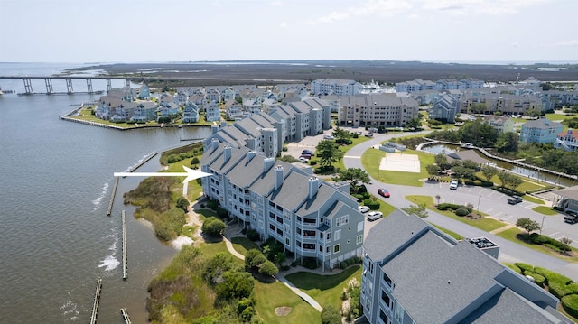 drone / aerial view with a water view