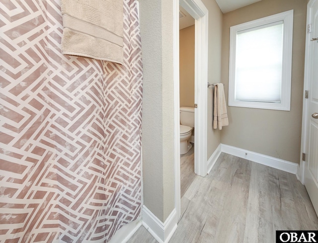 284 Old Swamp Rd, South Mills, NC 27976 - bathroom with toilet and wood finished floors