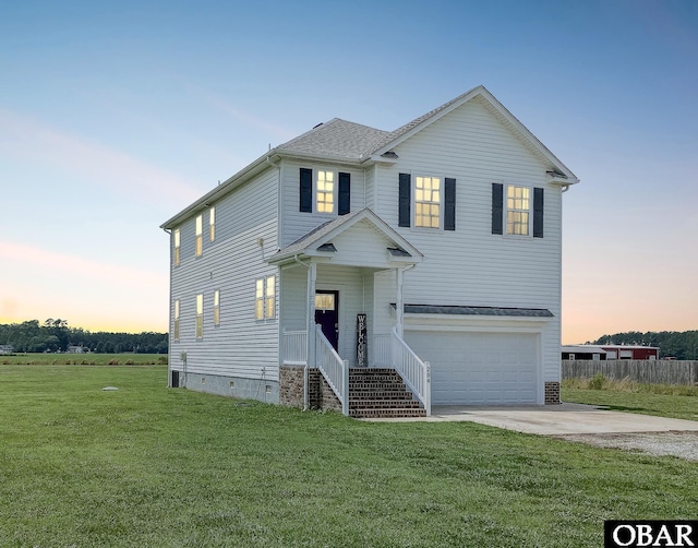 284 Old Swamp Rd, South Mills, NC 27976 - traditional-style home with a garage, concrete driveway, and crawl space