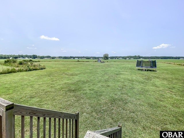 284 Old Swamp Rd, South Mills, NC 27976 - view of green lawn featuring a trampoline and a view of rural / pastoral area