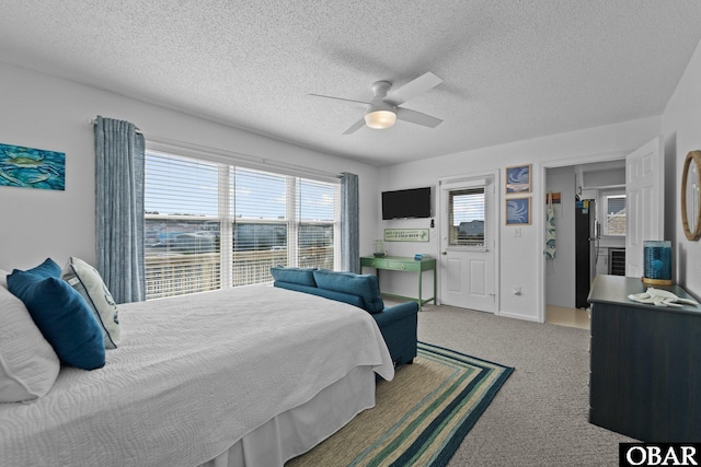 11 Pelican Watch Way Unit A/Lot11, Southern Shores, NC 27949 - bedroom featuring carpet, a textured ceiling, ceiling fan, and freestanding refrigerator