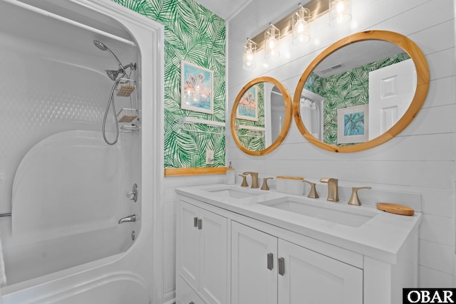 11 Pelican Watch Way Unit A/Lot11, Southern Shores, NC 27949 - bathroom with double vanity, shower / tub combination, and wallpapered walls