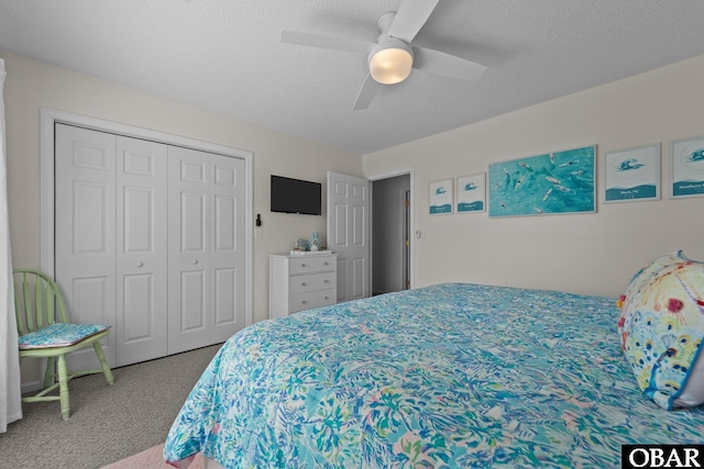 11 Pelican Watch Way Unit A/Lot11, Southern Shores, NC 27949 - bedroom with carpet, a closet, ceiling fan, and a textured ceiling