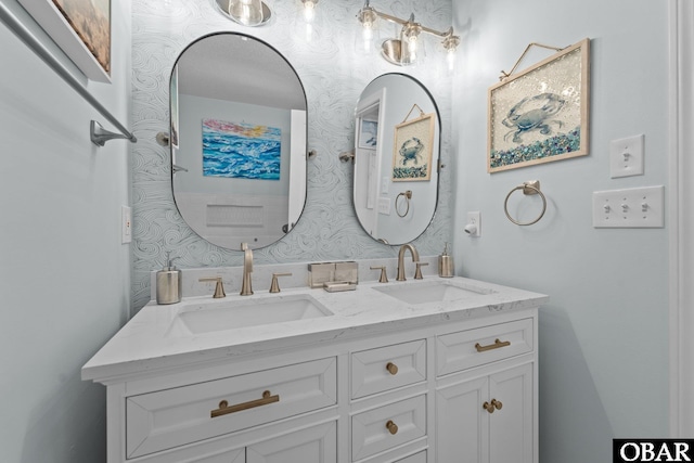 11 Pelican Watch Way Unit A/Lot11, Southern Shores, NC 27949 - full bath with double vanity and wallpapered walls