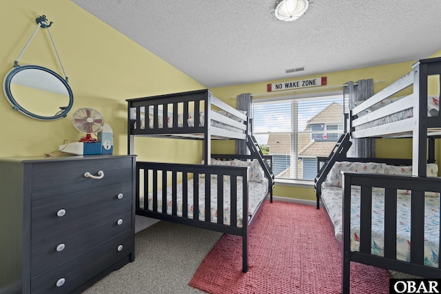 11 Pelican Watch Way Unit A/Lot11, Southern Shores, NC 27949 - carpeted bedroom with a textured ceiling
