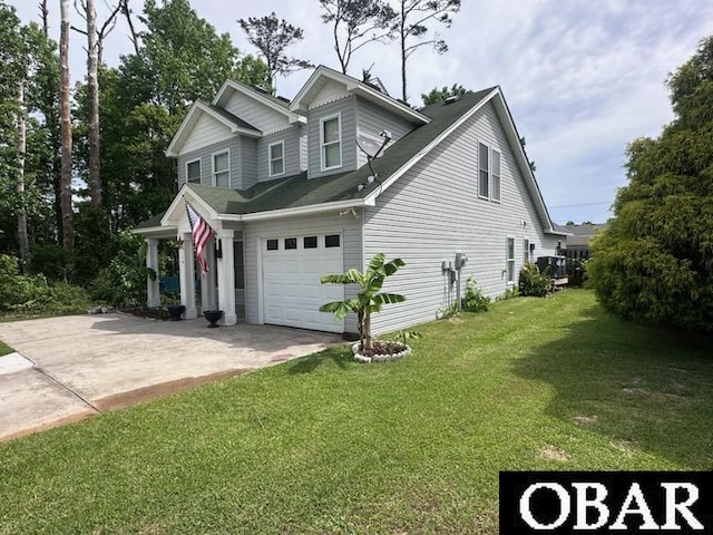 109 Golden Jubilee St Lot 9, Jarvisburg, NC 27947 - view of property exterior featuring concrete driveway, a lawn, and an attached garage