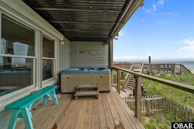26 Pelican Watch Way Unit 2, Southern Shores, NC 27949 - deck featuring a hot tub and a water view