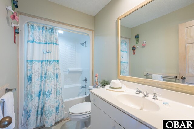 full bath featuring shower / bath combo, vanity, and toilet