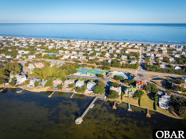 aerial view with a water view and a residential view