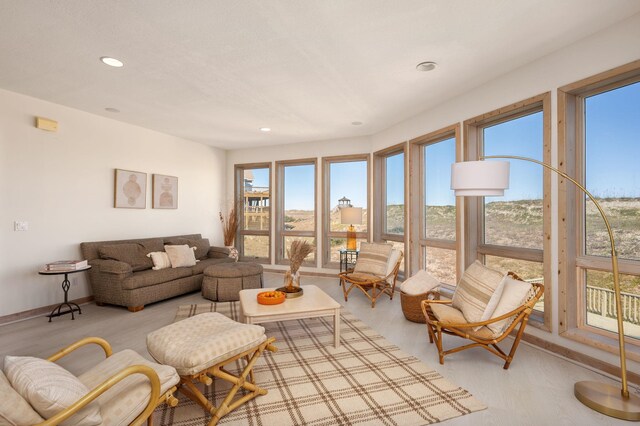 living area featuring recessed lighting