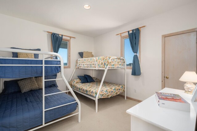 bedroom featuring carpet floors, recessed lighting, and baseboards