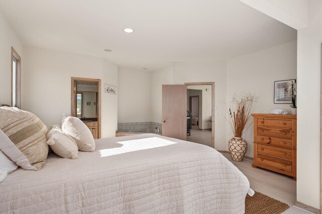 bedroom featuring recessed lighting