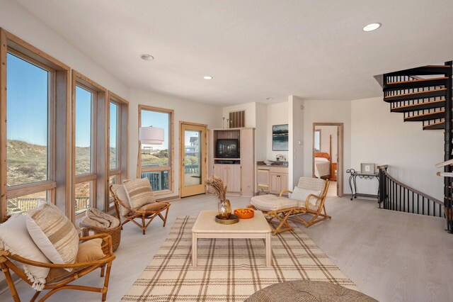 interior space featuring light wood finished floors and recessed lighting