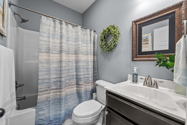 bathroom featuring shower / bathtub combination with curtain, vanity, and toilet