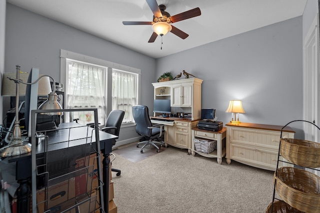 office featuring ceiling fan and carpet