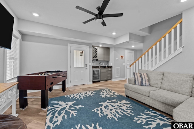 1207 Tail Wind Ct Lot 267, Corolla, NC 27927 - living area featuring wine cooler, bar with sink, a ceiling fan, light wood finished floors, and recessed lighting