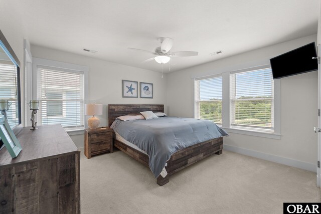 1207 Tail Wind Ct Lot 267, Corolla, NC 27927 - bedroom with light colored carpet, baseboards, and ceiling fan