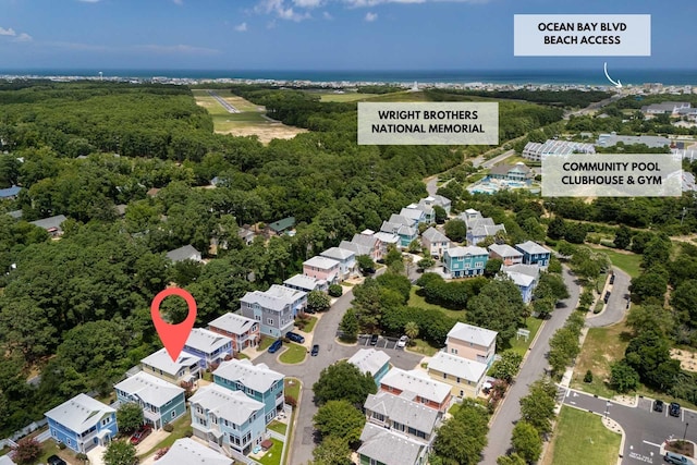 aerial view with a view of trees and a residential view