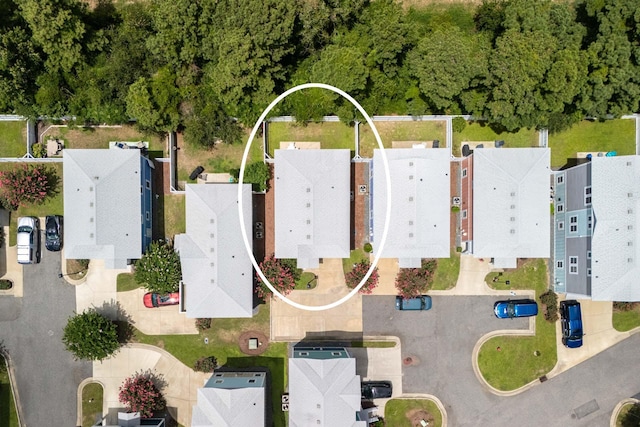 birds eye view of property with a residential view