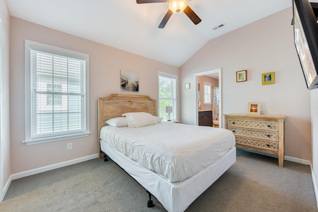 bedroom with visible vents, a ceiling fan, carpet flooring, baseboards, and vaulted ceiling