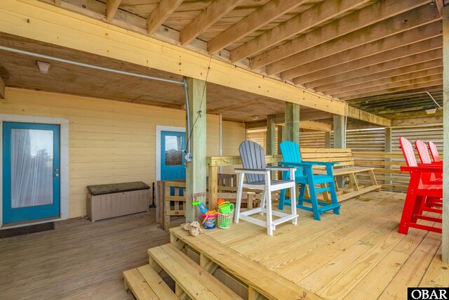 exterior space featuring a beach view and stairs