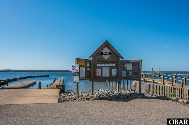 dock area with a water view