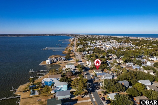 aerial view featuring a water view and a residential view