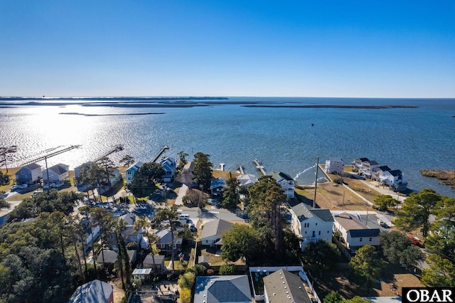 aerial view with a residential view and a water view