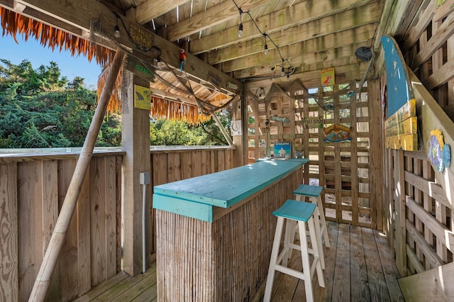 wooden terrace with outdoor dry bar