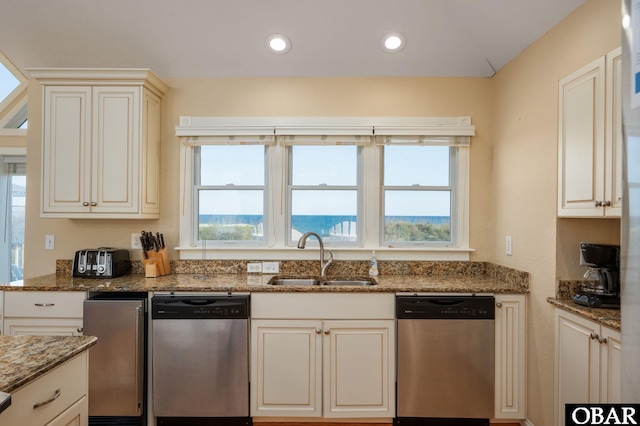5001 S Virginia Dare Trl Lot 25, Nags Head, NC 27959 - kitchen with dishwasher, a sink, stone countertops, recessed lighting, and cream cabinets