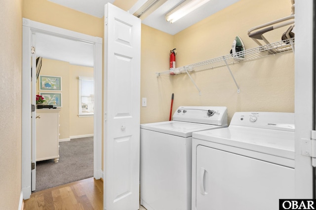 5001 S Virginia Dare Trl Lot 25, Nags Head, NC 27959 - laundry area featuring washer and dryer, light wood finished floors, and baseboards