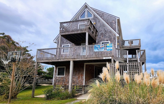 view of front of house featuring a wooden deck