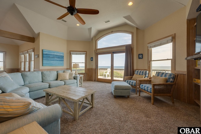 carpeted living area featuring a wainscoted wall, recessed lighting, and wooden walls