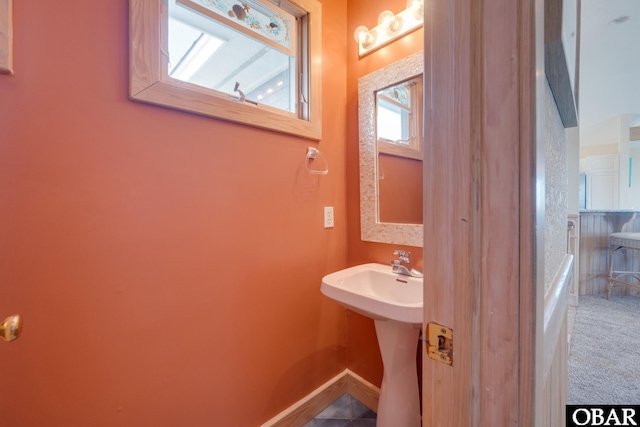 bathroom with baseboards