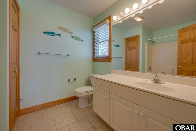 full bathroom with tile patterned flooring, baseboards, vanity, and toilet