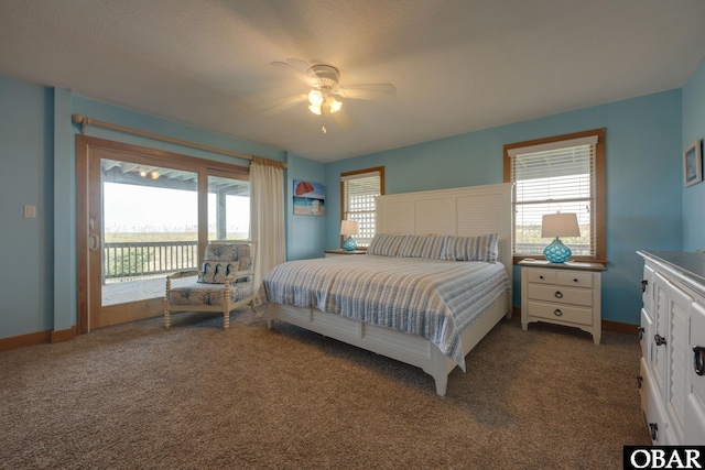 bedroom with access to outside, baseboards, and dark colored carpet