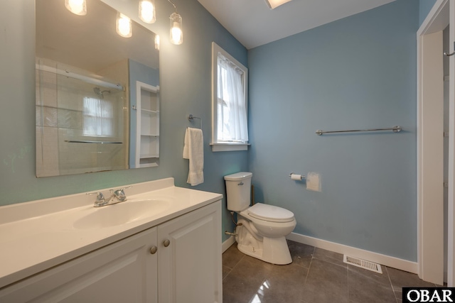 bathroom with visible vents, toilet, an enclosed shower, baseboards, and tile patterned floors