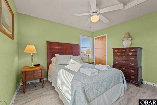 1620 Sandpiper Rd Lot 2, Corolla, NC 27927 - bedroom featuring baseboards, a ceiling fan, and light wood-style floors