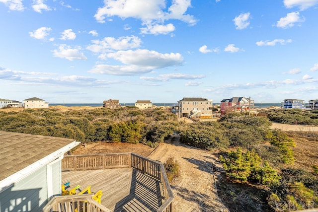 deck featuring a water view