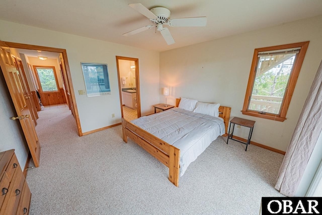 bedroom with baseboards, a ceiling fan, and carpet flooring
