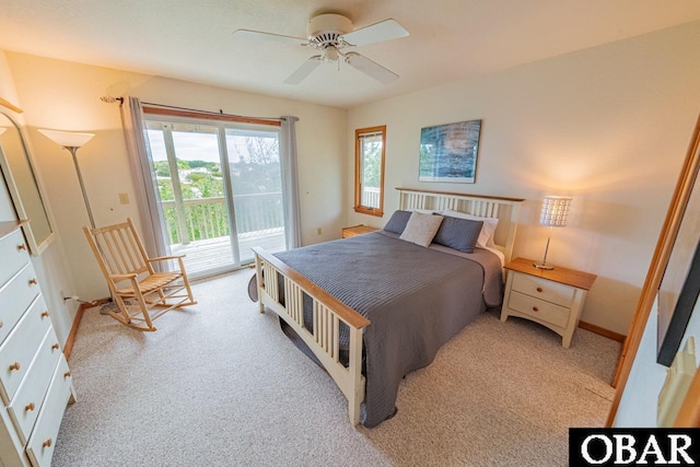 bedroom featuring a ceiling fan, baseboards, carpet floors, and access to exterior