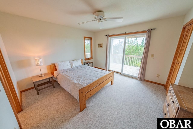 carpeted bedroom featuring ceiling fan, baseboards, and access to outside