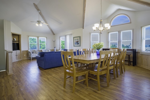 dining area featuring dark wood-type flooring, high vaulted ceiling, and ceiling fan with notable chandelier