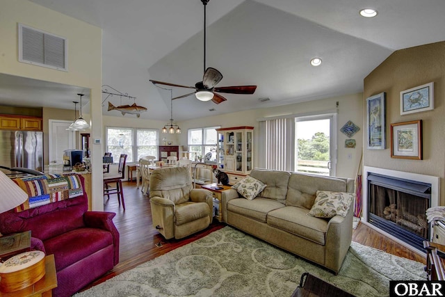 50059 Blackbeards Ct Lot # 166, Frisco, NC 27936 - living area featuring vaulted ceiling, ceiling fan, wood finished floors, a fireplace, and recessed lighting
