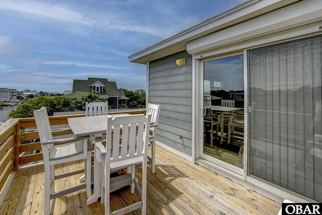 50059 Blackbeards Ct Lot # 166, Frisco, NC 27936 - wooden deck featuring outdoor dining area