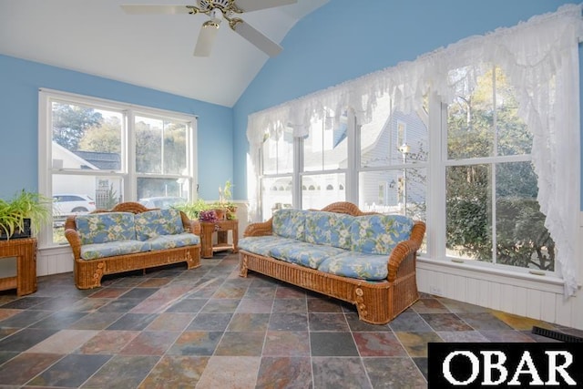 sunroom / solarium featuring ceiling fan, visible vents, and vaulted ceiling