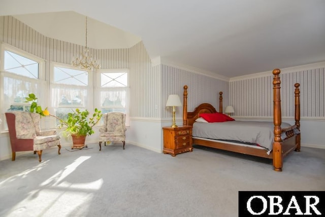 bedroom with carpet floors, baseboards, and a notable chandelier