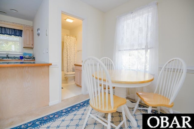 dining area featuring visible vents